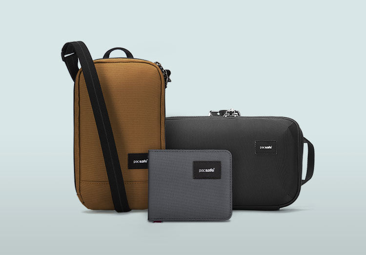 Pacsafe Sac à épaule bandoulière gris foncé noir pour femme et homme Pacsafe Sac à épaule bandoulière gris foncé noir pour femme et homme