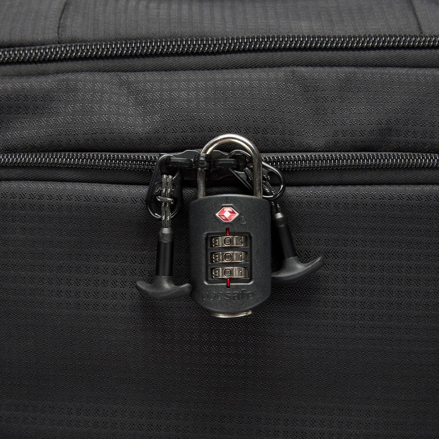 Premium Photo | Man closing suitcase with combination lock at home closeup